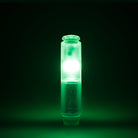 Capsule glowing green