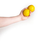 holding 2 yellow balls