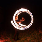 performer with fire poi