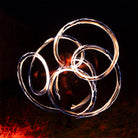 performer with fire poi