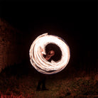 performer with fire poi