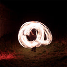 performer with fire poi