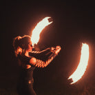 performer with fire poi